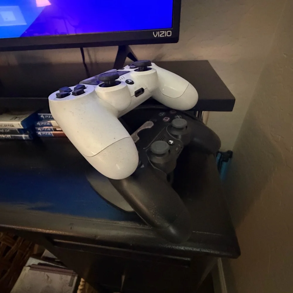 Sony PlayStation 4 with 2 Controllers and 8 Games